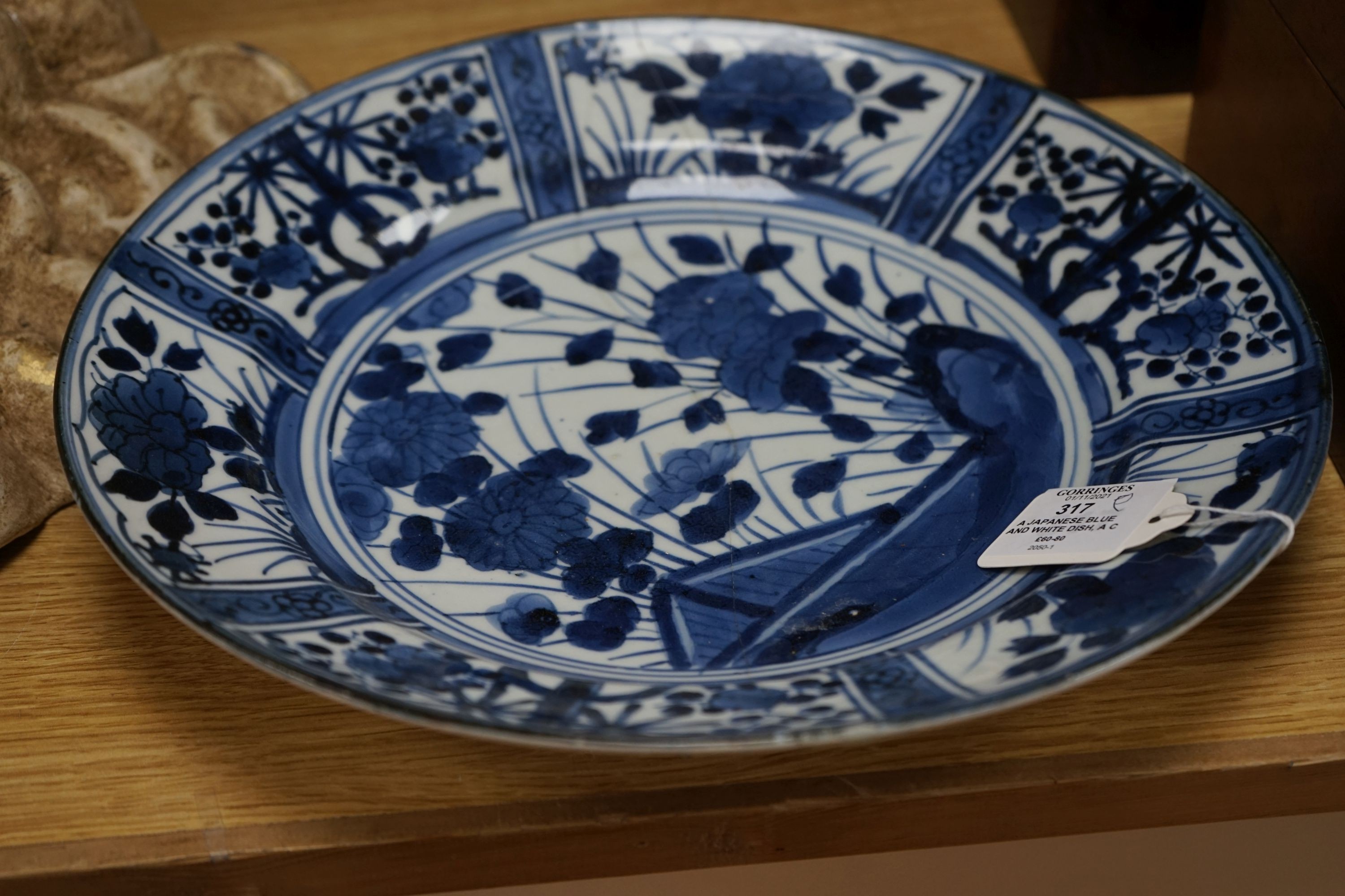 A Japanese blue and white dish, a Chinese blue and white meiping and a clobbered plate 33cm